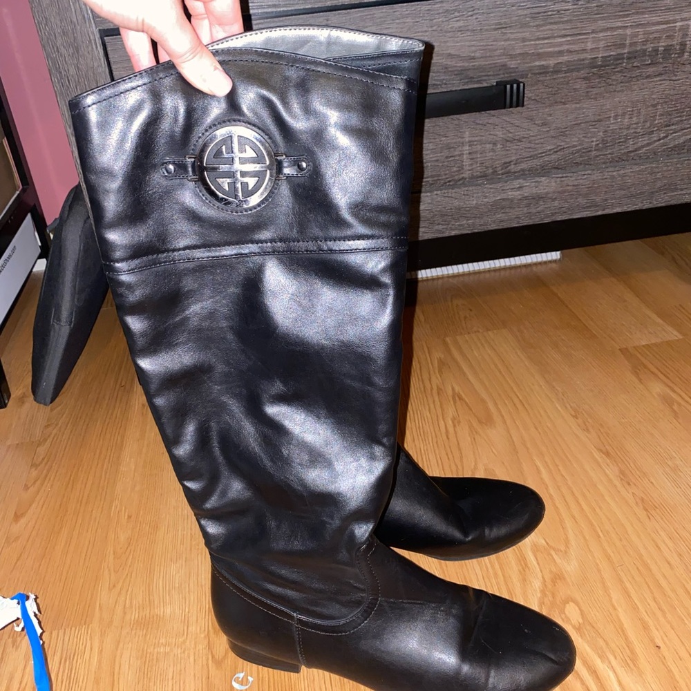 Tall faux leather boots. Great for fall or winter !